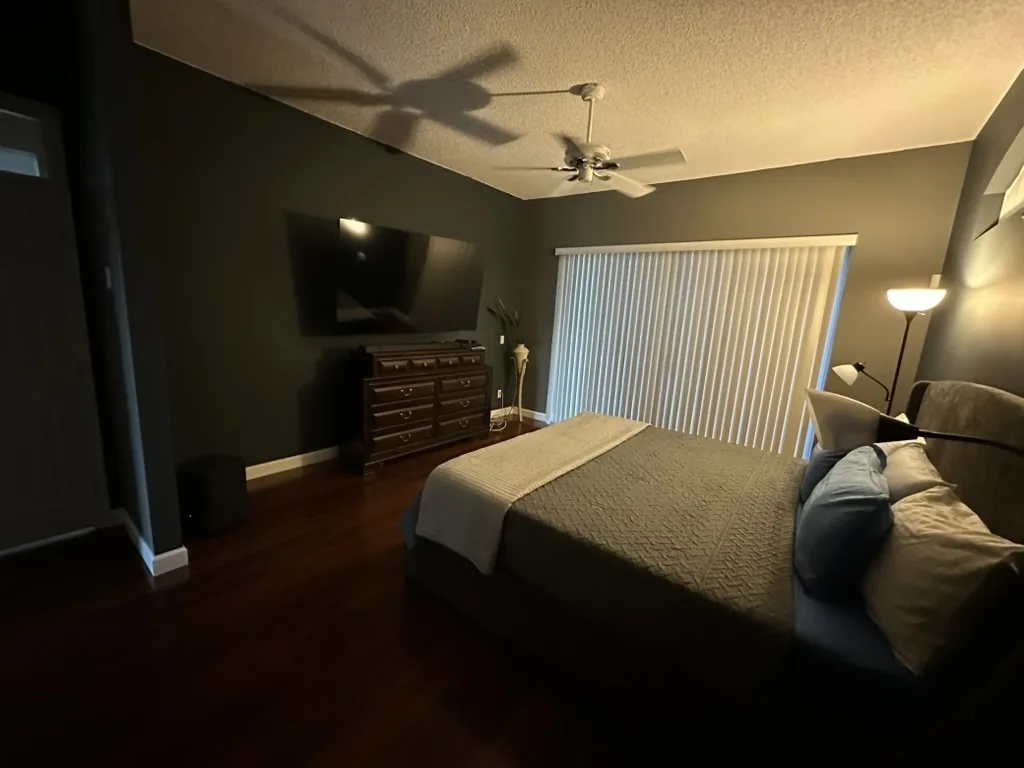 Wider furnished view of the completed Boynton Beach primary bedroom