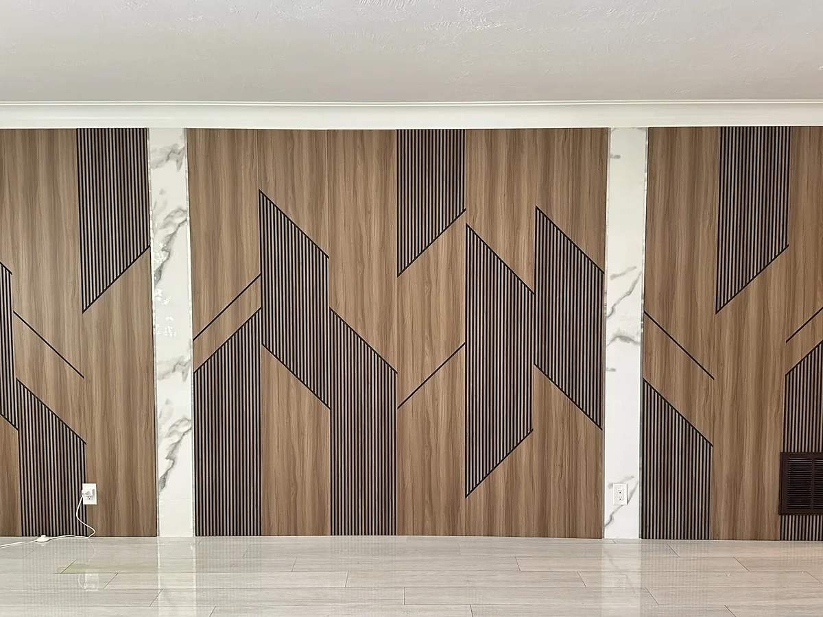Finished interior with geometric wood-look wall panels